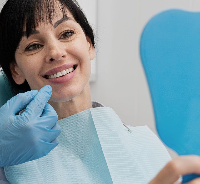 Dentist Doing Check Up To Patient