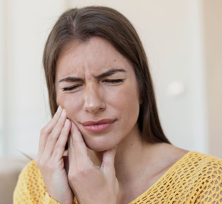 Woman Suffering From Terrible Strong Teeth Pain