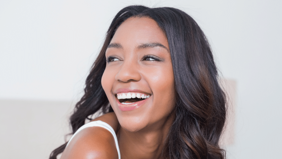 Smiling woman with bright teeth.